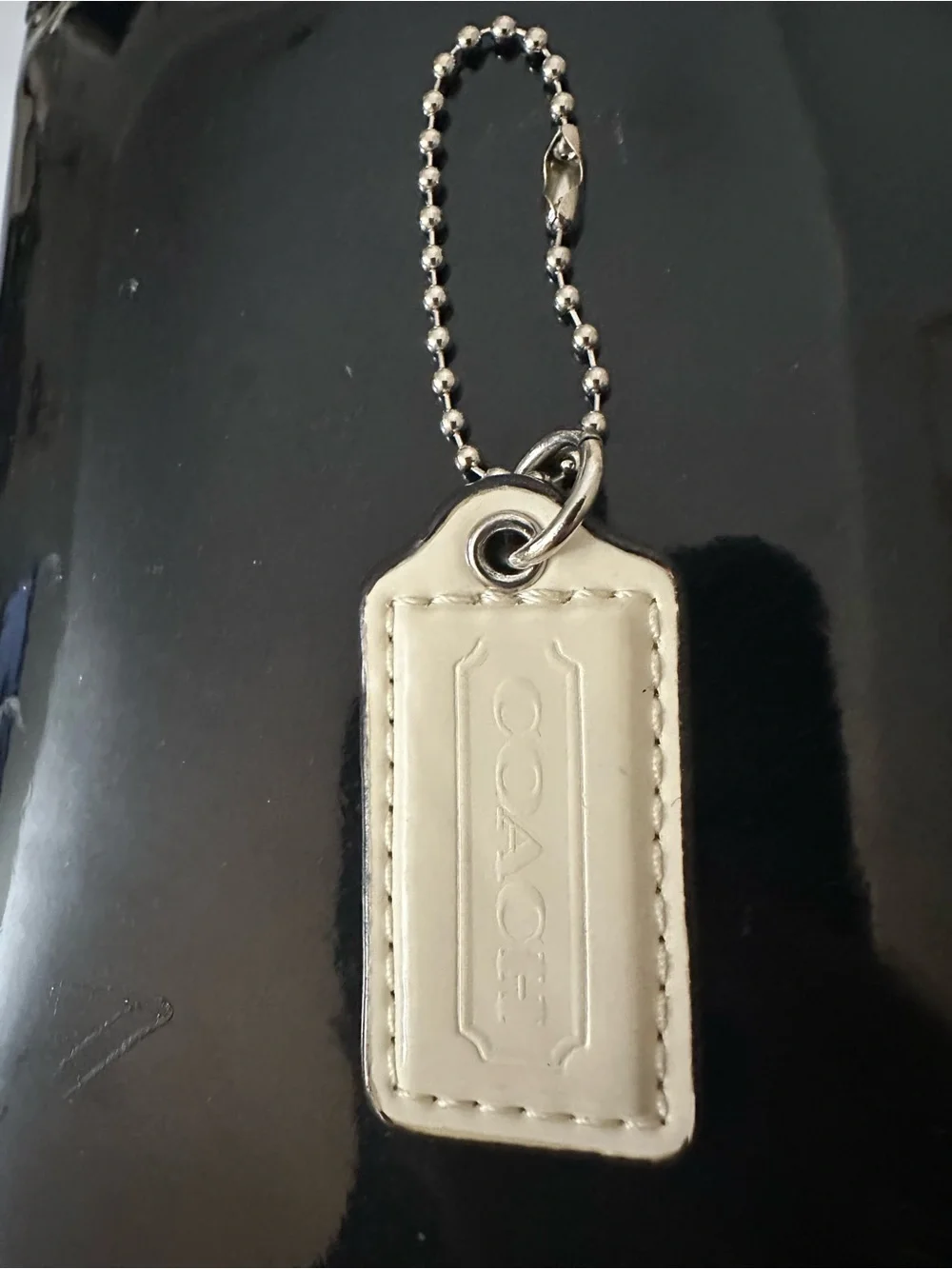 COACH Leather Hangtag | Bag Charm in Cream with Embossed Logo